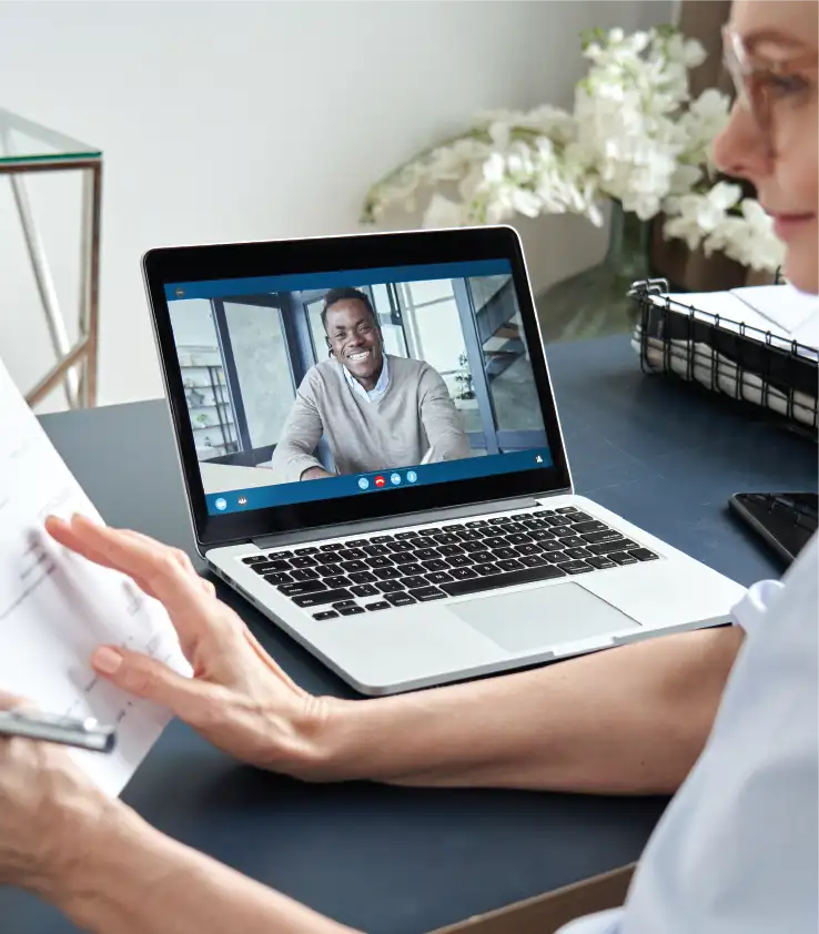 Interview happening on a computer via a platform similar to zoom Interview happening on a computer via a platform similar to zoom